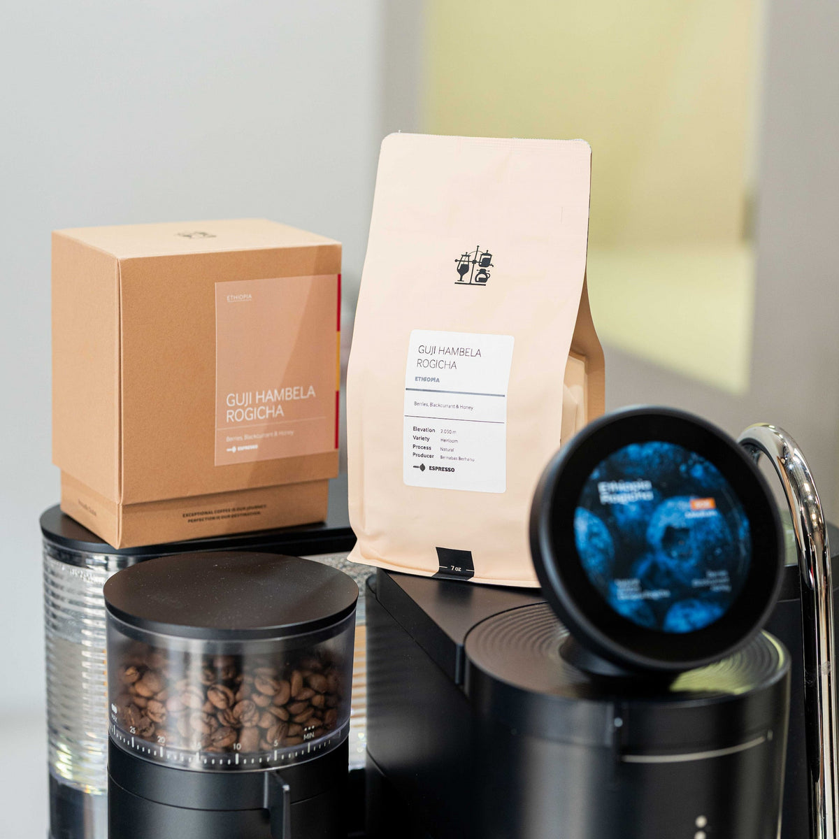 coffee beans beside a Meraki espresso machine